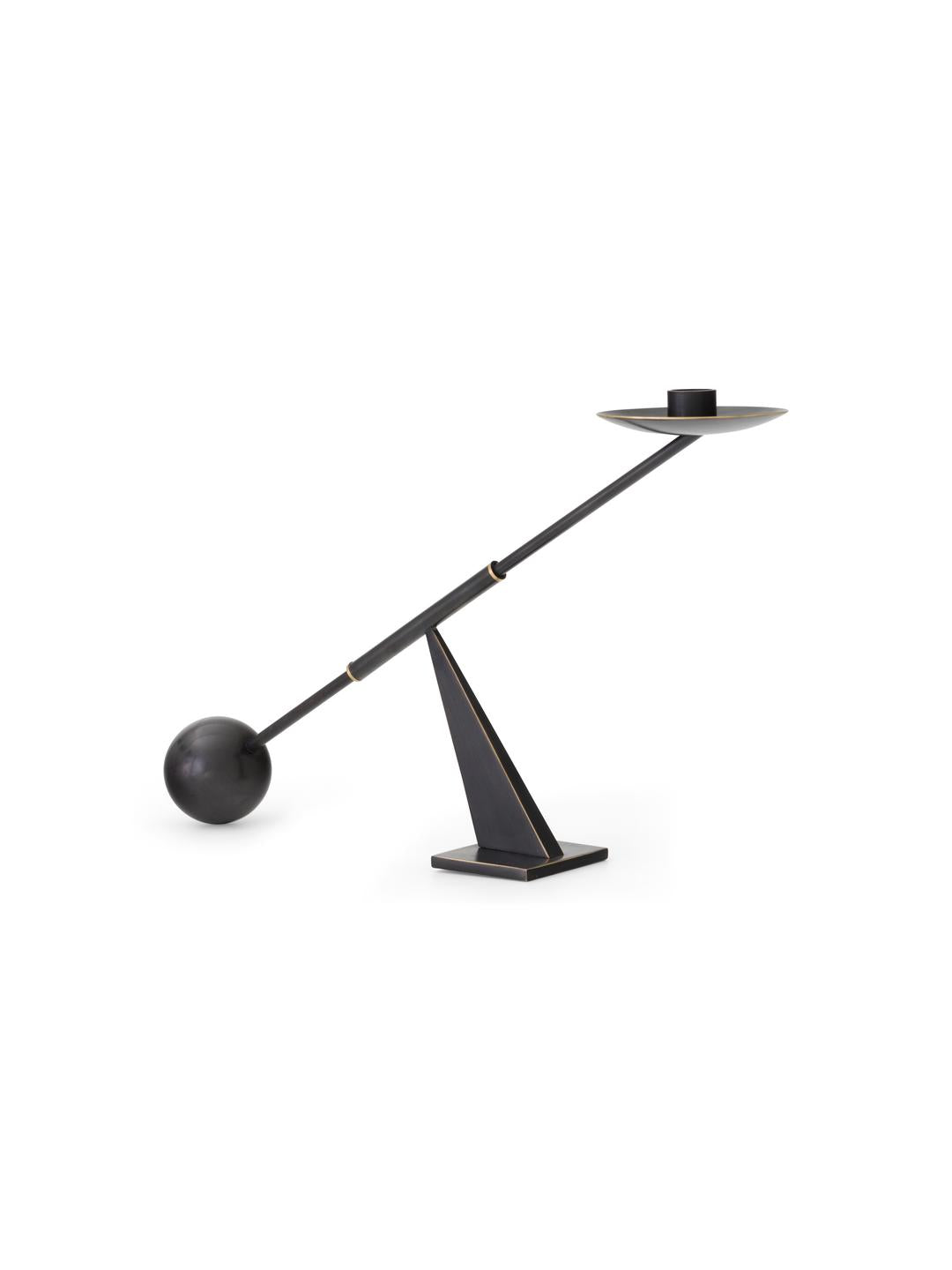 Black metal balance candlestick with angled triangular base, long rod counterwei