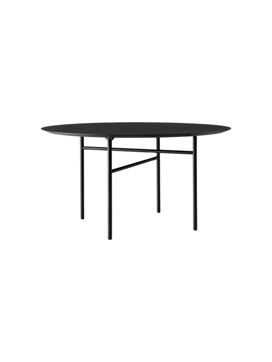 A black, round Snaregade Dining Table with a minimalist design, featuring a thin top and a geometric base of slender legs.