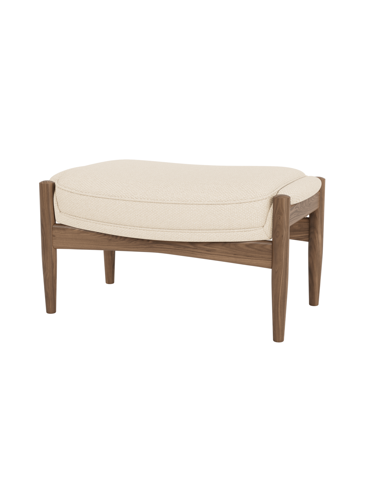 The Seal Ottoman featuring textured Logan Jasmine upholstery and a solid walnut frame with tapered, organic legs.
