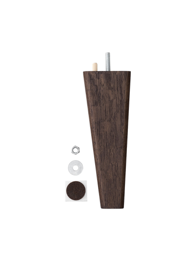 A tapered furniture leg in dark wood, with fittings: metal screw, dowel, nut, washer, and a square felt floor protector.