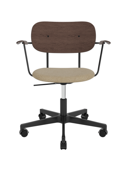 Co Task Chair featuring a dark stained oak back, beige bouclé upholstered seat and black swivel base with castors.