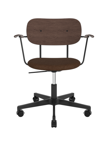 Co Task Chair featuring a brown bouclé seat, dark stained oak back and armrests, on a black swivel base with castors.