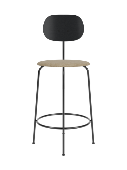 Afteroom Counter Chair Plus with black painted oak backrest and beige Audo Bouclé 02 upholstered seat on a black frame.