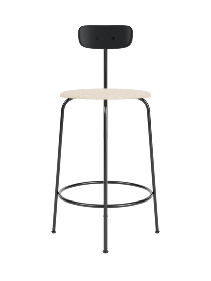 Afteroom Counter Chair featuring a black painted oak back and Logan Jasmine upholstered seat on a sleek black steel frame.