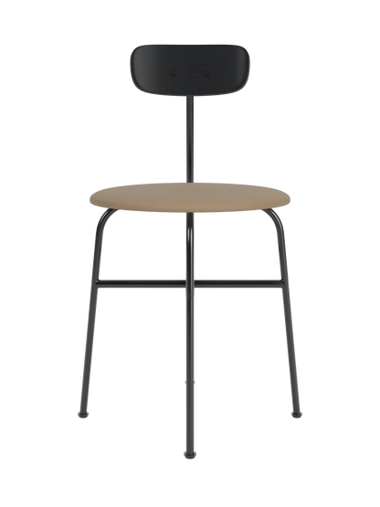 Afteroom Dining Chair with a black painted oak backrest, black steel frame and tan leather upholstered seat.