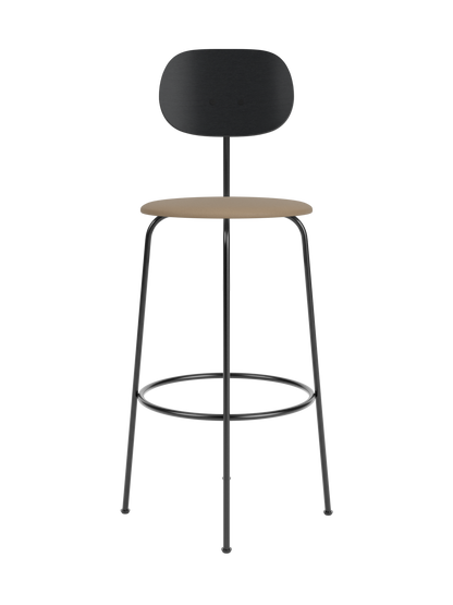 Afteroom Bar Chair Plus featuring a tan upholstered seat, black painted oak backrest and slender black steel frame.