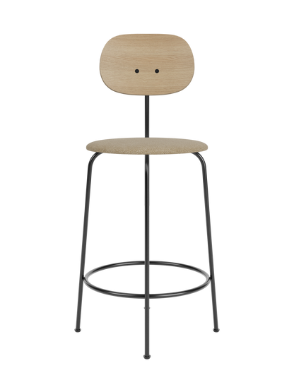 Afteroom Counter Chair Plus featuring a natural oak backrest and beige bouclé seat on a slim black metal frame.