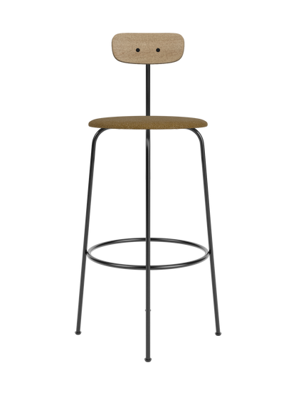 Afteroom Bar Chair featuring a black steel frame, natural oak backrest and a brown bouclé upholstered seat.