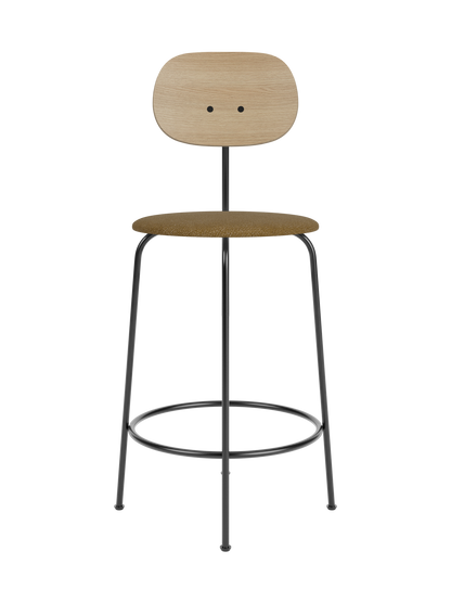 Afteroom Counter Chair Plus with natural oak back and brown bouclé upholstered seat on a black steel frame.