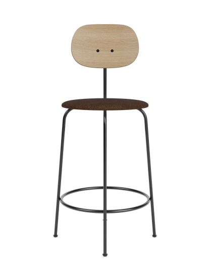 Afteroom Counter Chair Plus with natural oak backrest and brown bouclé seat on a black powder-coated steel frame.