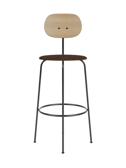 Afteroom Bar Chair Plus featuring a natural oak backrest and brown bouclé seat on a slender black powder-coated frame.