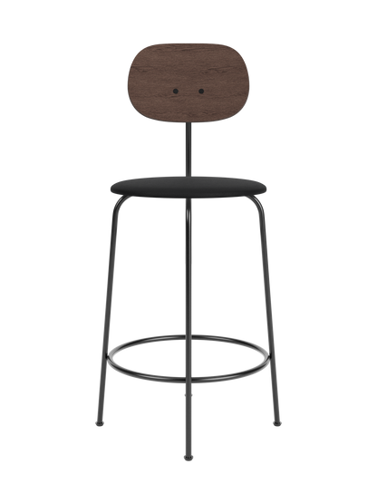 Afteroom Counter Chair Plus featuring a dark stained oak backrest, black upholstered seat and slender black metal frame.