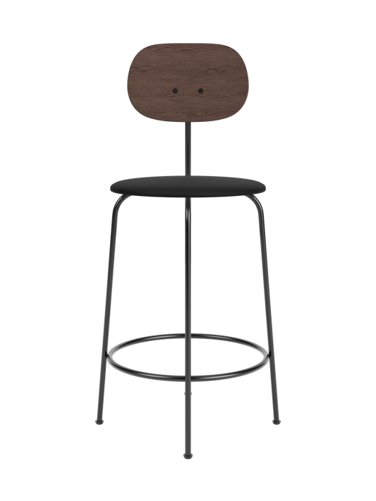 Afteroom Counter Chair Plus featuring a dark stained oak backrest, black upholstered seat and slender black metal frame.