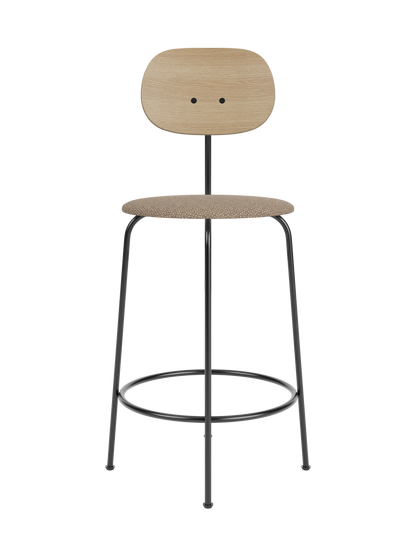 Afteroom Counter Chair Plus featuring a natural oak backrest and Logan Flint upholstered seat on a black steel frame.