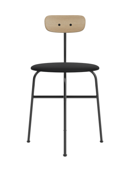 Afteroom Dining Chair with a natural oak backrest and black Sierra leather seat on a black steel frame.