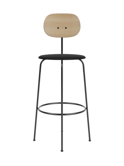 Afteroom Bar Chair Plus featuring a natural oak backrest and black upholstered seat on a slender black metal frame.