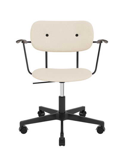 Fully upholstered Co Task Chair in Logan Jasmine with dark stained oak armrests and a black swivel base with castors.