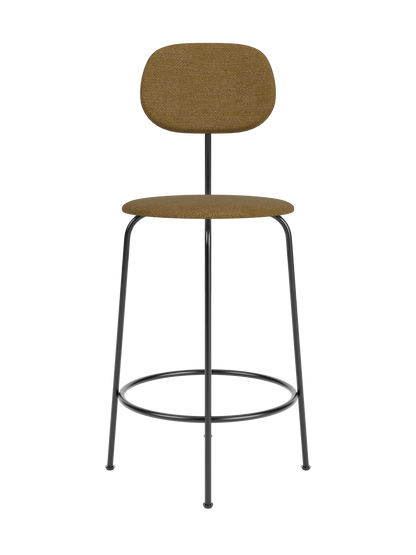 Afteroom Counter Chair Plus in brown bouclé fabric with a minimalist black metal frame and circular footrest.