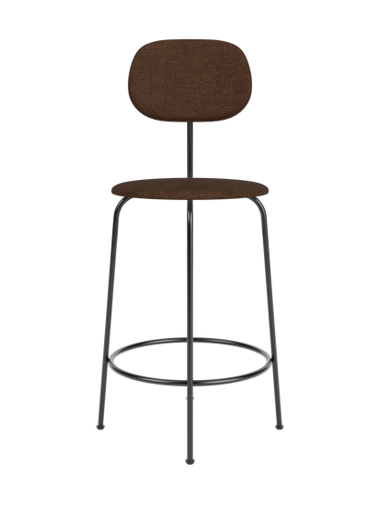 Afteroom Counter Chair Plus in brown bouclé upholstery with a slim black metal frame and integrated footrest.