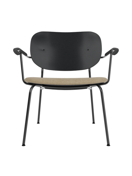 Co Lounge Chair featuring a black oak backrest, beige Audo Bouclé upholstered seat and a slim black steel frame.