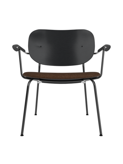 Co Lounge Chair in black oak with a brown bouclé upholstered seat and a minimalist black steel frame.