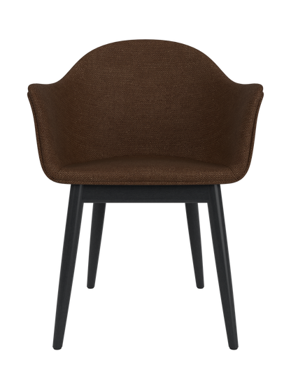 Harbour Dining Chair with dark brown Audo Bouclé 07 upholstery and a black painted oak base, seen from the front.