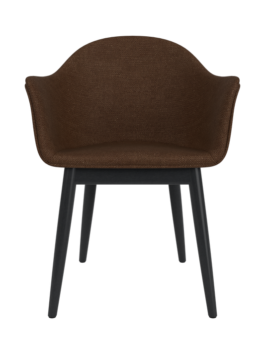 Harbour Dining Chair with dark brown Audo Bouclé 07 upholstery and a black painted oak base, seen from the front.
