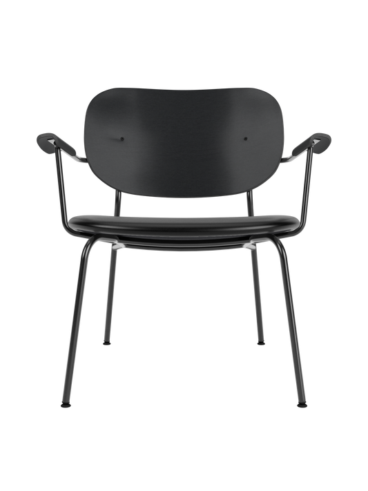 Co Lounge Chair in black painted oak with a black Dakar leather upholstered seat and a slender steel frame.