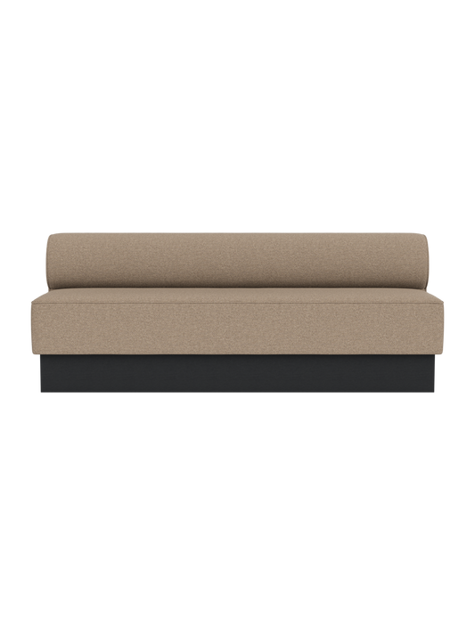 Eave Dining Sofa, Plateau in Logan Flint upholstery with a black painted oak base, viewed from the front.