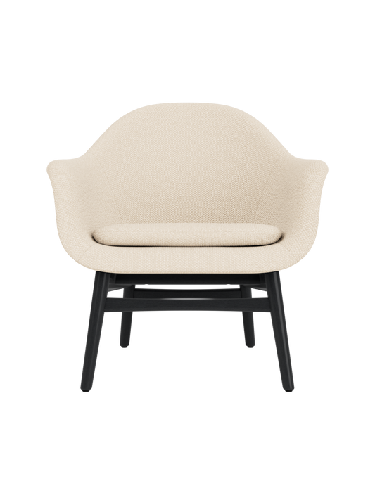 Sculptural Harbour Lounge Chair in cream Logan Jasmine upholstery with a solid black painted oak wood base.