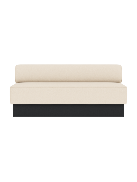Eave Dining Sofa, Plateau in Logan Jasmine upholstery with a black painted oak base, viewed from the front.
