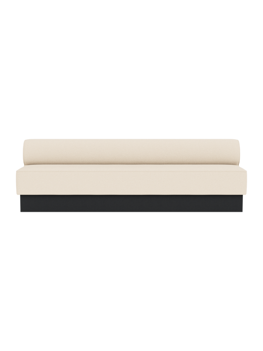Eave Dining Sofa, Plateau in Logan Jasmine upholstery with a black painted oak base, viewed from the front.