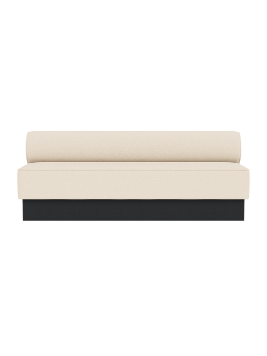 Eave Dining Sofa, Plateau in Logan Jasmine upholstery with a black painted oak base, viewed from the front.
