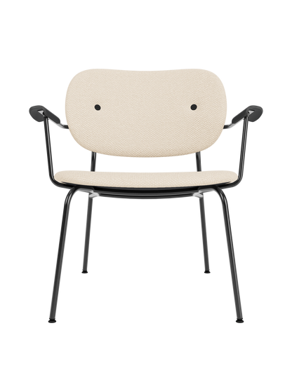 Fully upholstered Co Lounge Chair in Logan Jasmine fabric with black painted oak armrests and a slender steel frame.