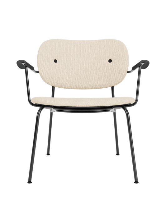Fully upholstered Co Lounge Chair in Logan Jasmine fabric with black painted oak armrests and a slender steel frame.