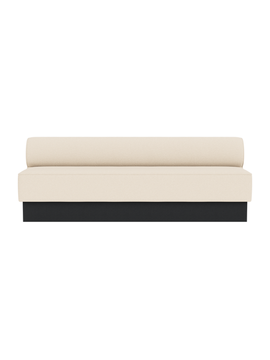 Eave Dining Sofa, Plateau in Logan Jasmine upholstery with a black painted oak base, viewed from the front.
