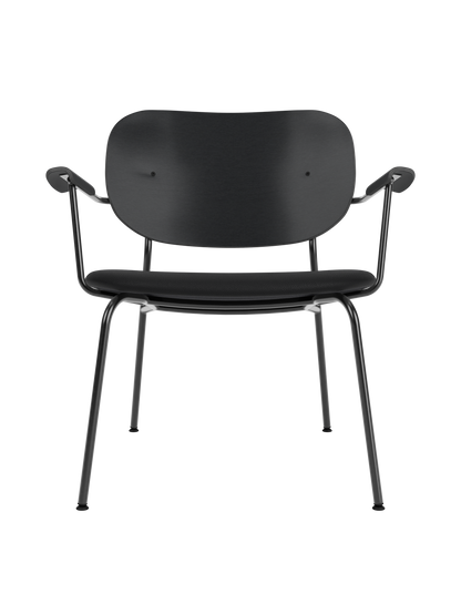 Co Lounge Chair featuring a black painted oak backrest and black leather seat on a slender powder-coated steel frame.