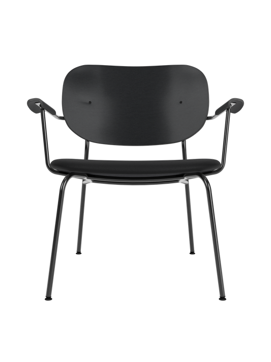 Co Lounge Chair featuring a black painted oak backrest and black leather seat on a slender powder-coated steel frame.