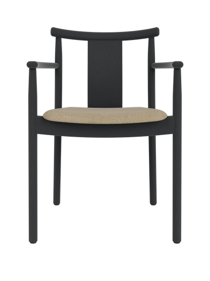 Black stained oak Merkur Dining Chair with armrests and a textured beige Audo Bouclé 02 upholstered seat.
