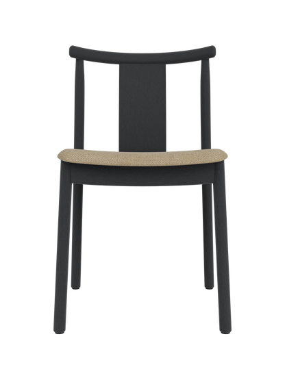 Black stained oak Merkur Dining Chair featuring a textured beige Audo Bouclé 02 upholstered seat.