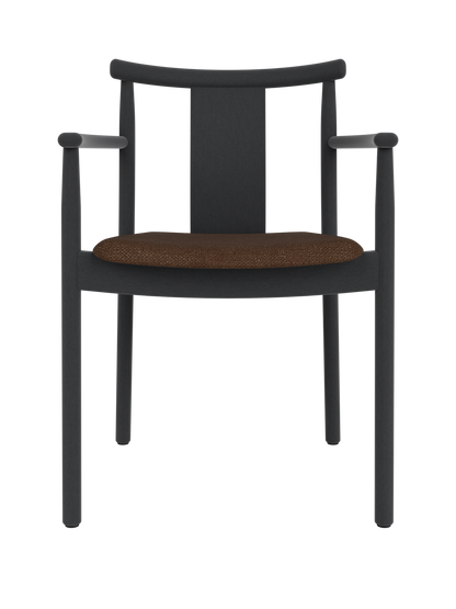 Merkur Dining Chair with armrests in black stained oak featuring a textured brown Audo Bouclé 07 upholstered seat.