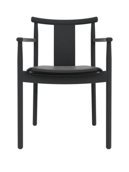 Merkur Dining Chair with Armrests in black stained oak with a black leather seat, viewed from the front.