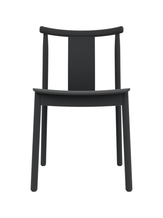 Merkur Dining Chair in black stained oak, featuring a curved backrest and timeless solid wood construction.