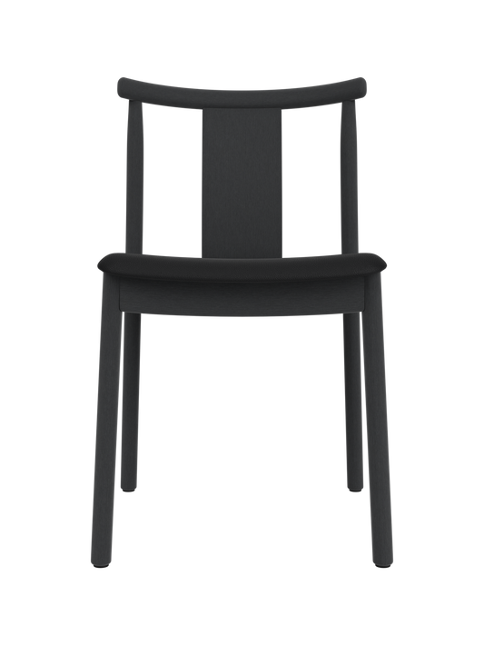 Merkur Dining Chair in black stained oak with a black leather seat, featuring a sleek and modern silhouette.