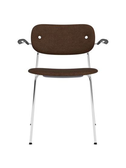 Fully upholstered Co Dining Chair with armrests, featuring a chrome frame and dark brown Bouclé 07 fabric.