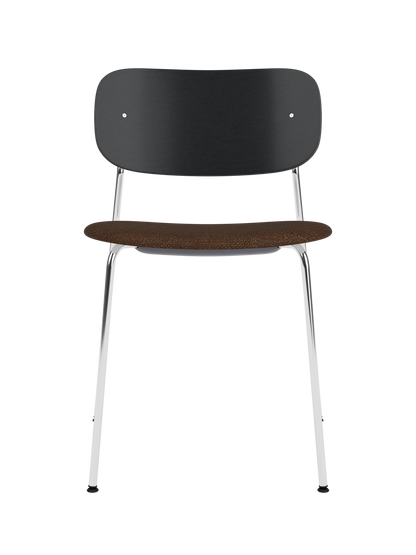 Co Dining Chair featuring a chrome frame, black painted oak backrest and brown Audo Bouclé upholstered seat.