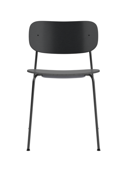 Co Dining Chair featuring a black painted oak veneer seat and backrest on a slender black powder-coated steel frame.