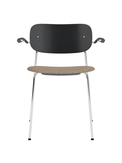 Co Dining Chair with armrests, black painted oak backrest, Logan Flint upholstered seat and a polished chrome frame.