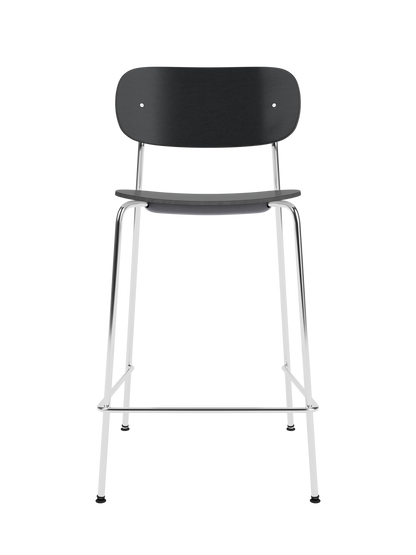 Co Counter Chair in black painted oak veneer with a chrome steel frame shown against a black background.