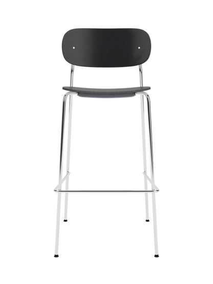 Co Bar Chair with black oak veneer and a chrome frame shown from the front against a black background.